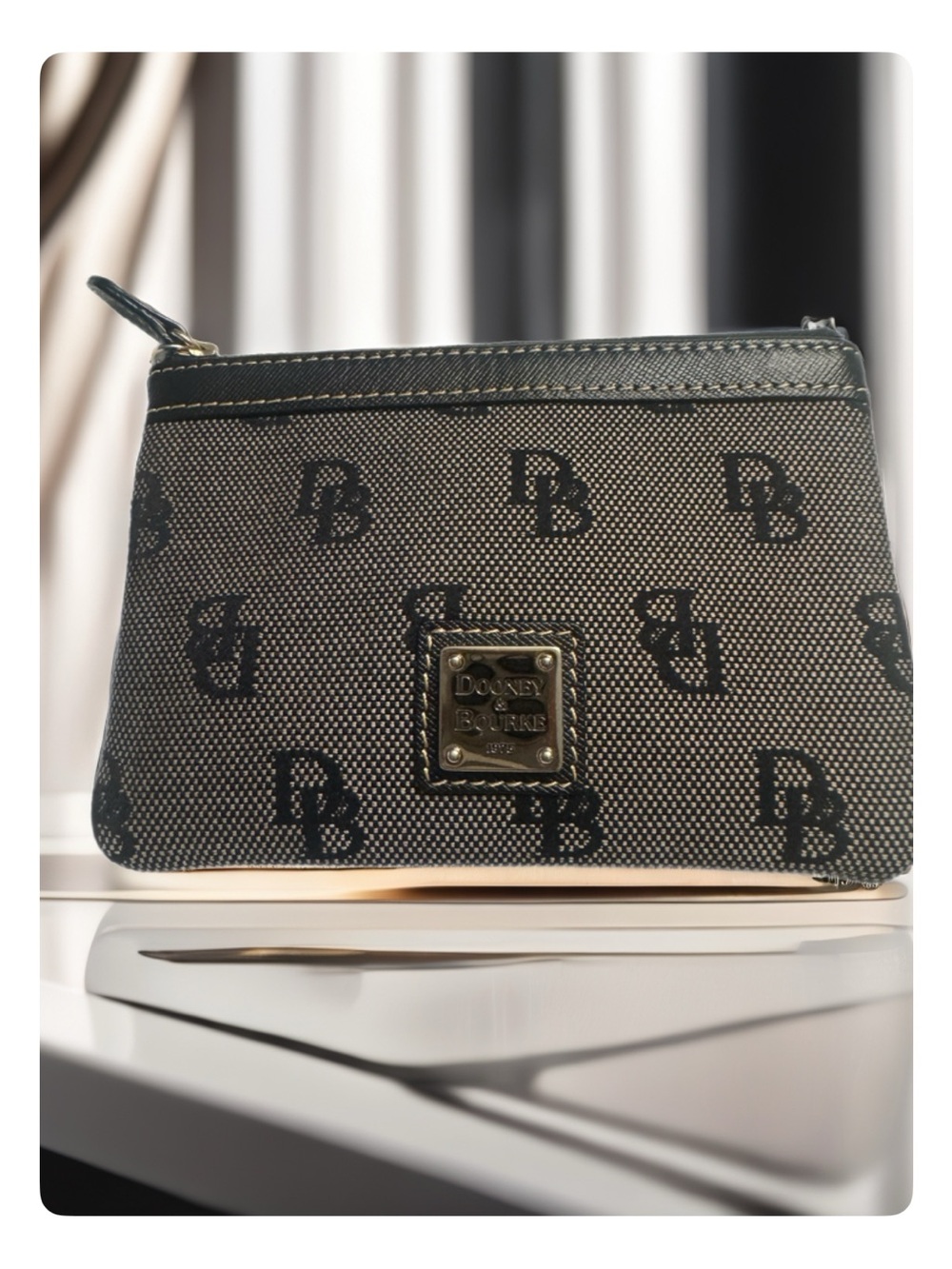 Dooney & Bourke Black and Tan Logo Wristlet Coin Purse with Gold Plaque